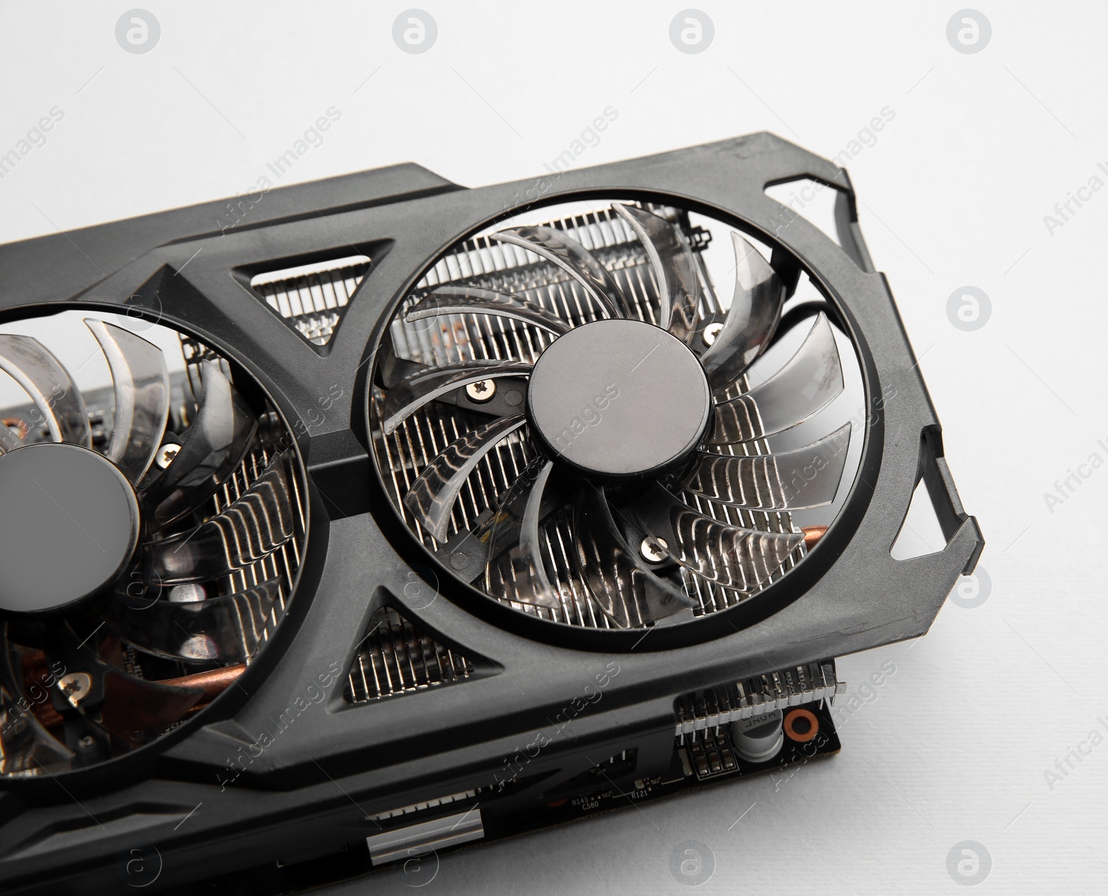 Photo of One graphics card on color background, closeup