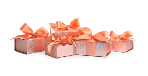 Photo of Many beautiful pink gift boxes on white background