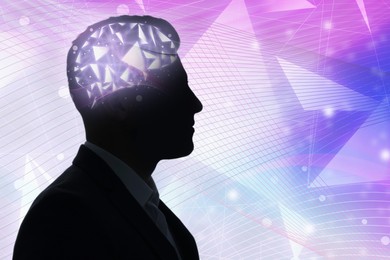 Memory. Silhouette of man with illustration of brain against bright background