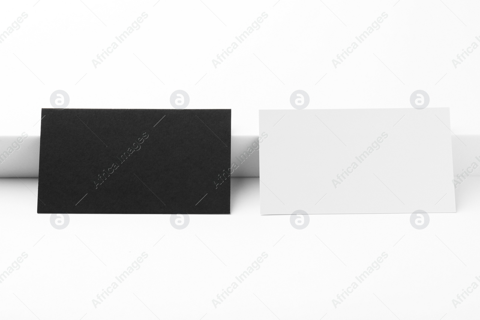 Photo of Business cards on white background. Mockup for design