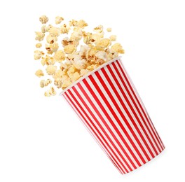 Popcorn flying into bucket on white background