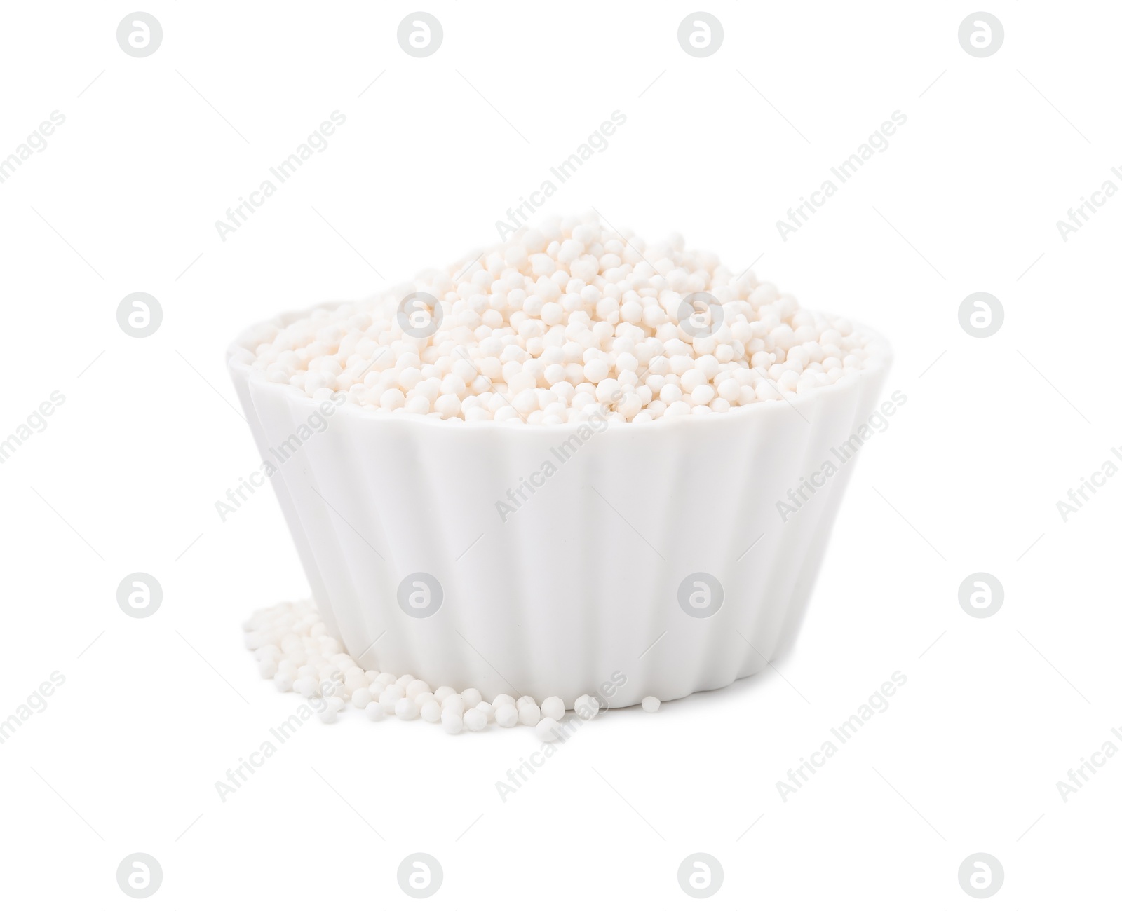 Photo of Tapioca pearls in bowl isolated on white