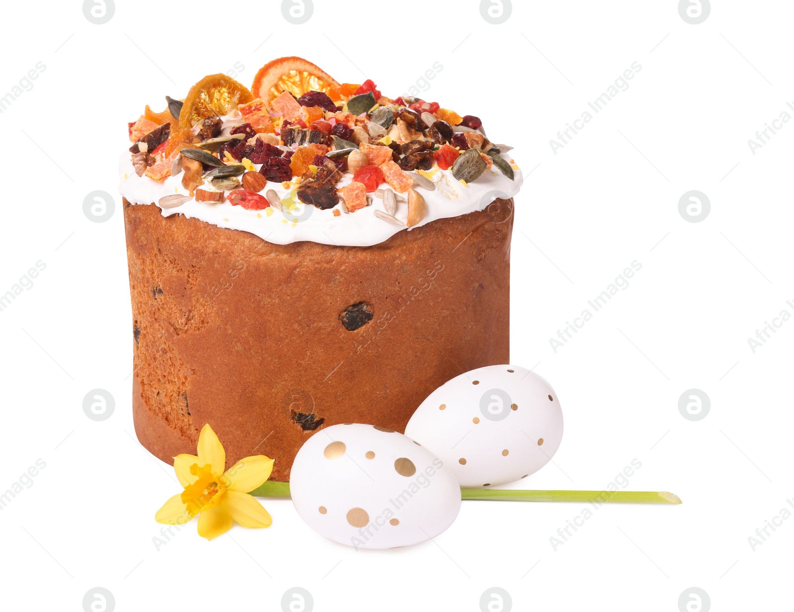 Photo of Traditional Easter cake with dried fruits and painted eggs isolated on white