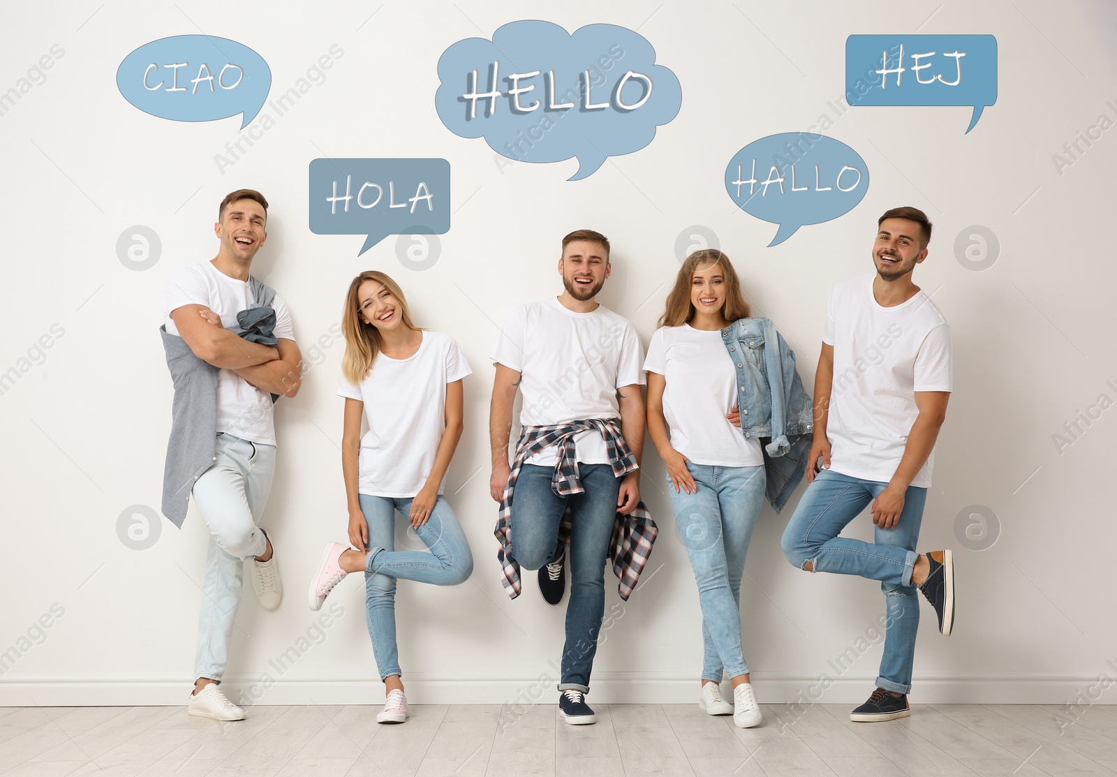 Image of Happy people posing near light wall and illustration of speech bubbles with word Hello written in different languages