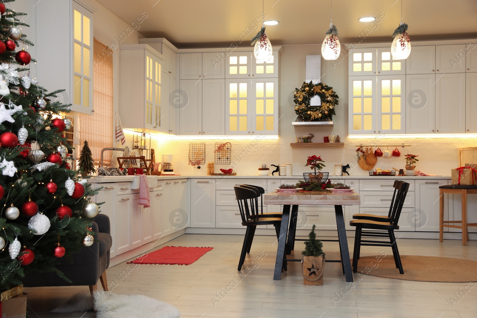 Photo of Cozy dining room interior with Christmas tree and beautiful festive decor