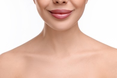 Woman with beautiful lips on white background, closeup