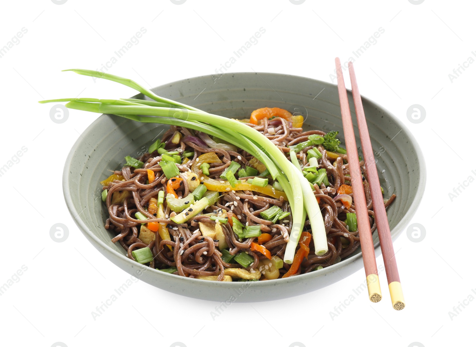 Photo of Stir-fry. Delicious cooked noodles with chicken in bowl and chopsticks isolated on white