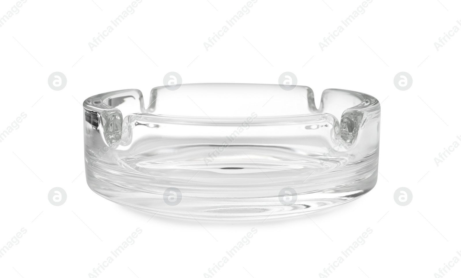 Photo of One empty glass ashtray isolated on white