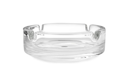 Photo of One empty glass ashtray isolated on white