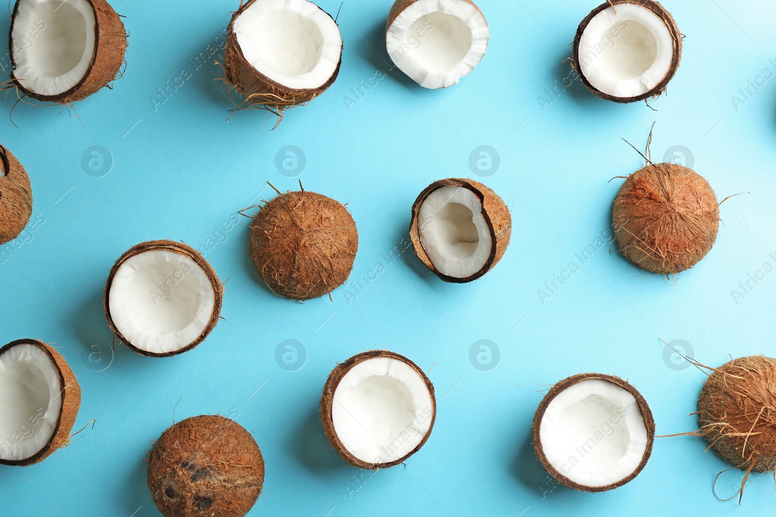 Photo of Coconut pattern on color background, flat lay