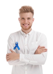 Young man with blue ribbon on white background. Urology cancer awareness