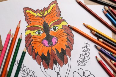 Photo of Child's colored drawing with pencils, flat lay
