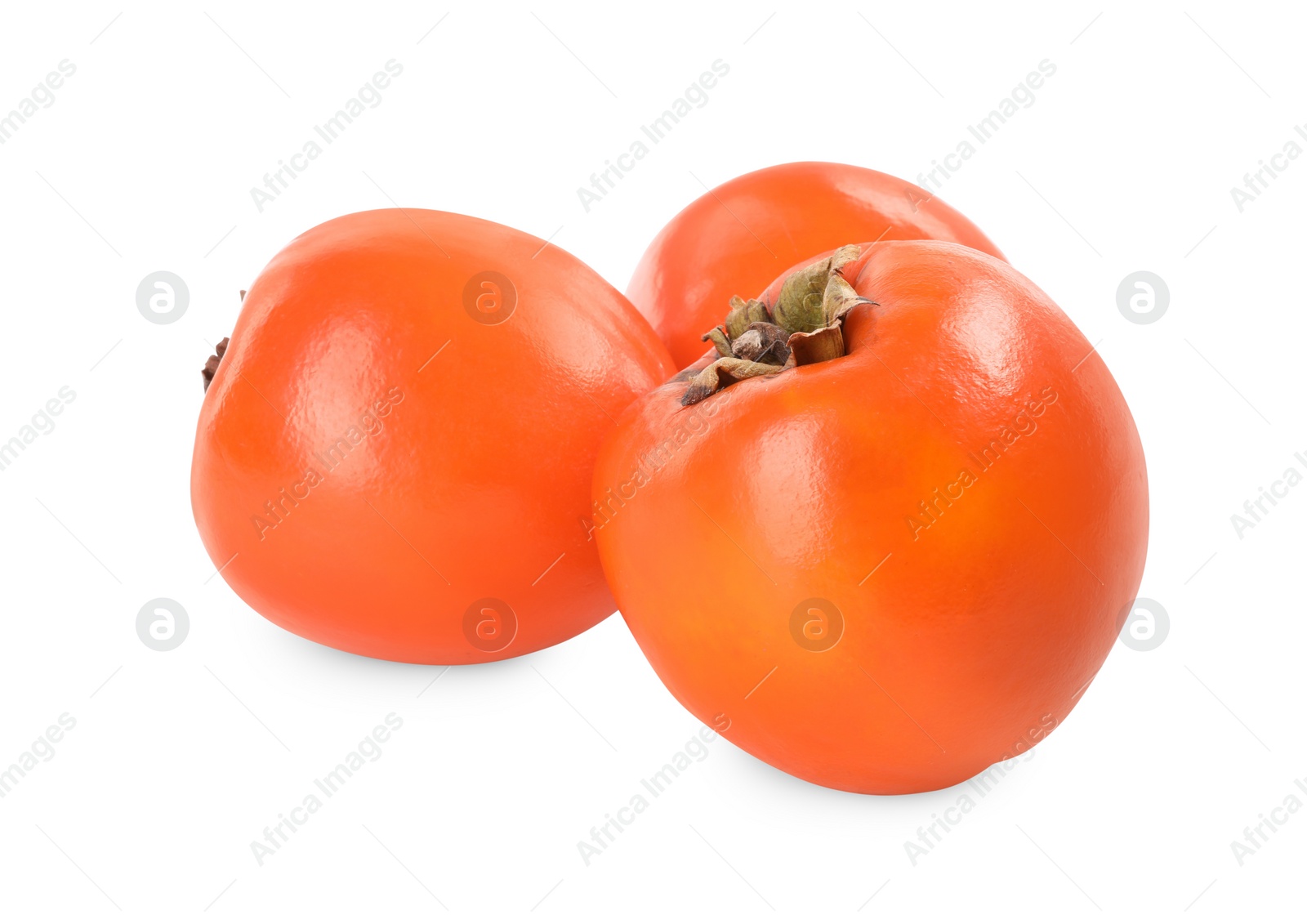 Photo of Delicious ripe juicy persimmons isolated on white