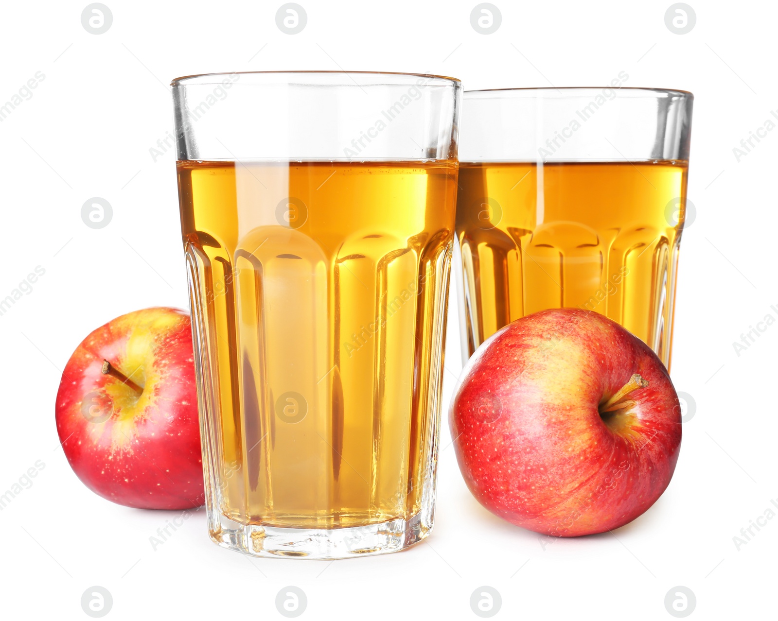 Photo of Glasses of juice and fresh apples on white background