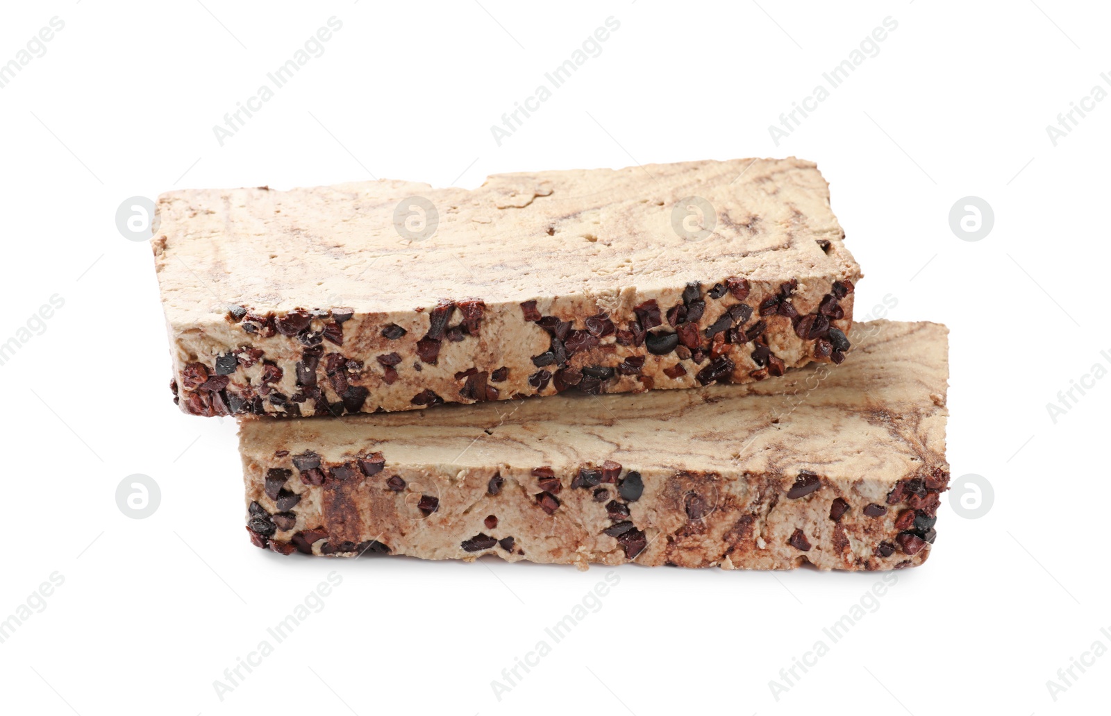 Photo of Pieces of tasty chocolate halva isolated on white