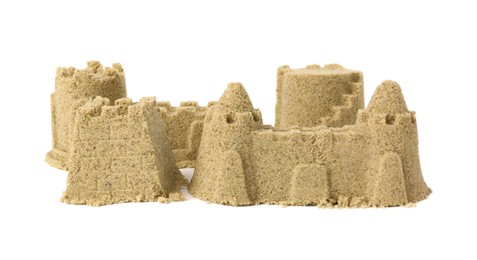 Photo of Beautiful sand castle isolated on white. Outdoor play