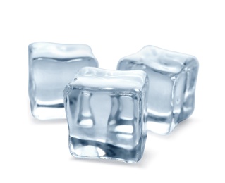 Crystal clear ice cubes on white background