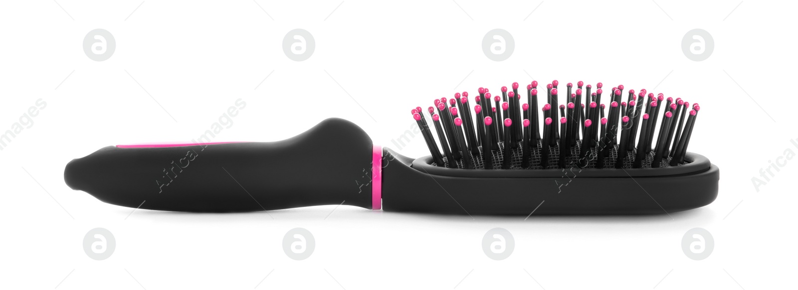 Photo of New modern hair brush isolated on white