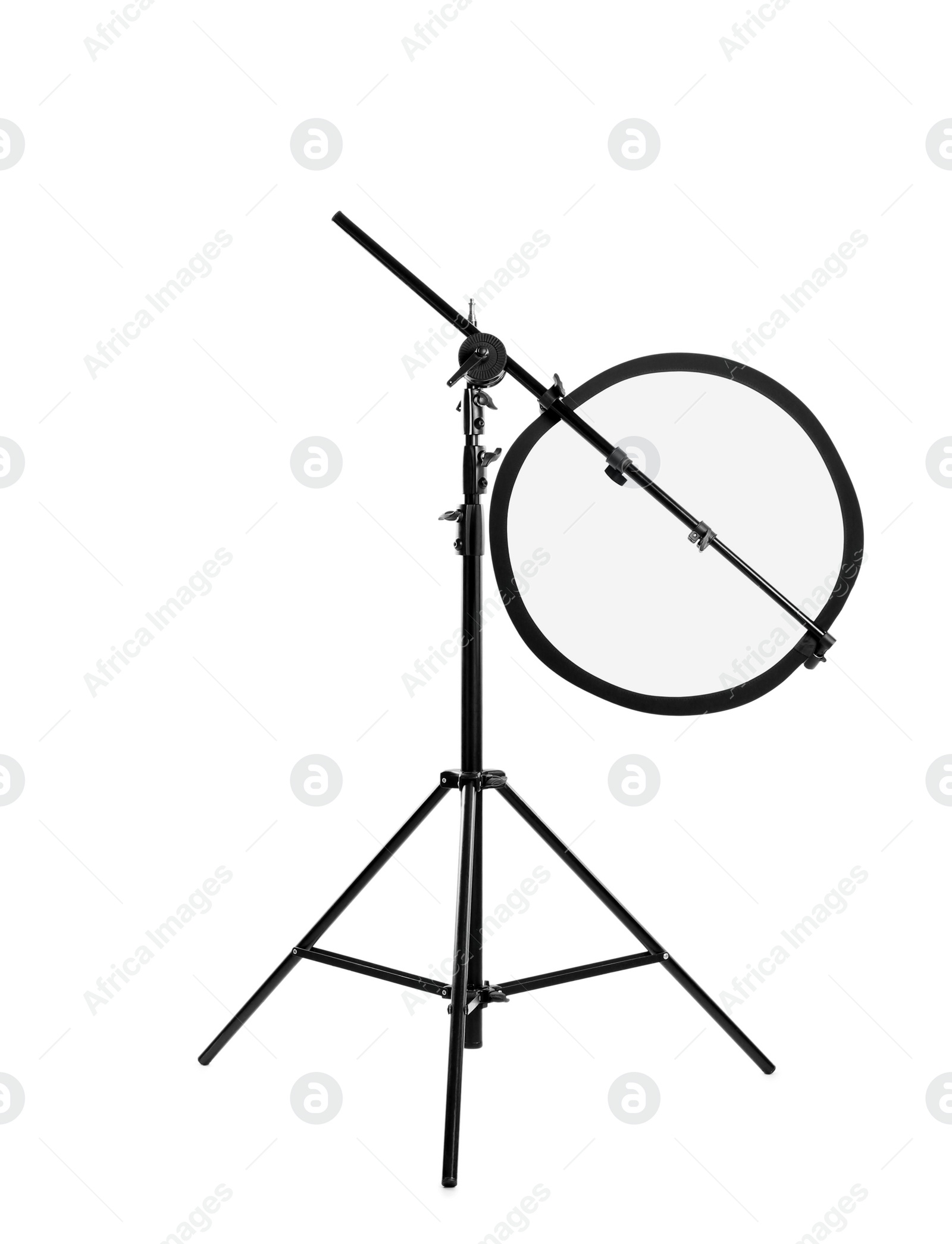 Photo of Tripod with studio reflector isolated on white. Professional photographer's equipment