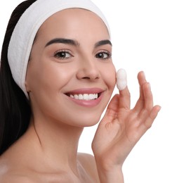 Photo of Woman using silkworm cocoon in skin care routine on white background