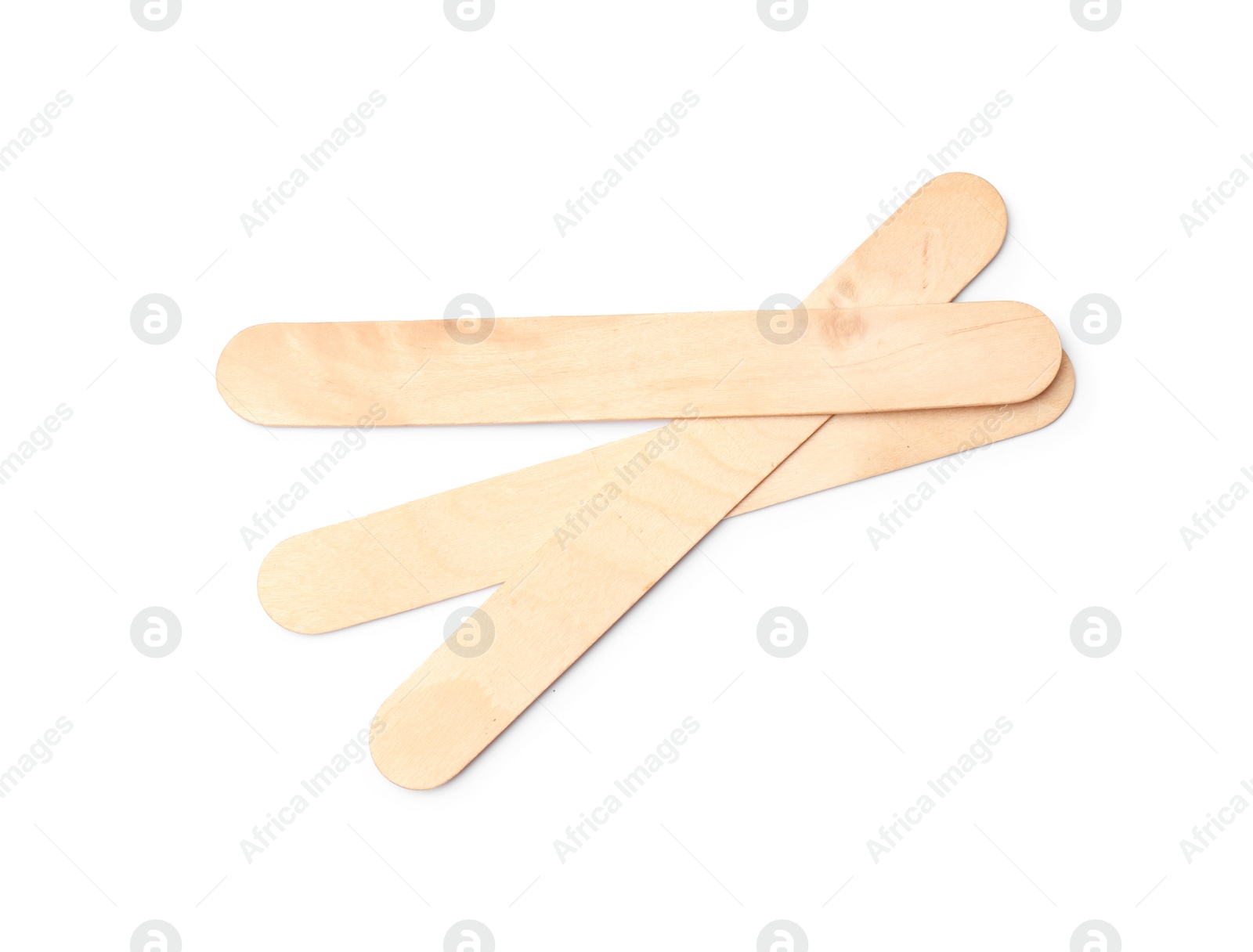 Photo of Empty wooden ice cream sticks on white background, top view