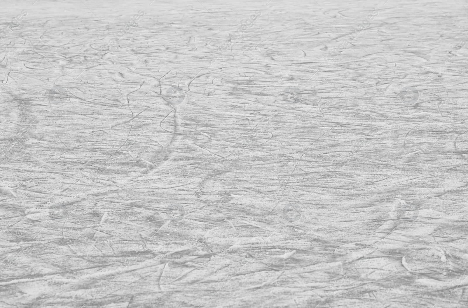 Photo of Frozen ice skating surface as background. Winter season