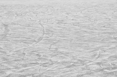 Photo of Frozen ice skating surface as background. Winter season
