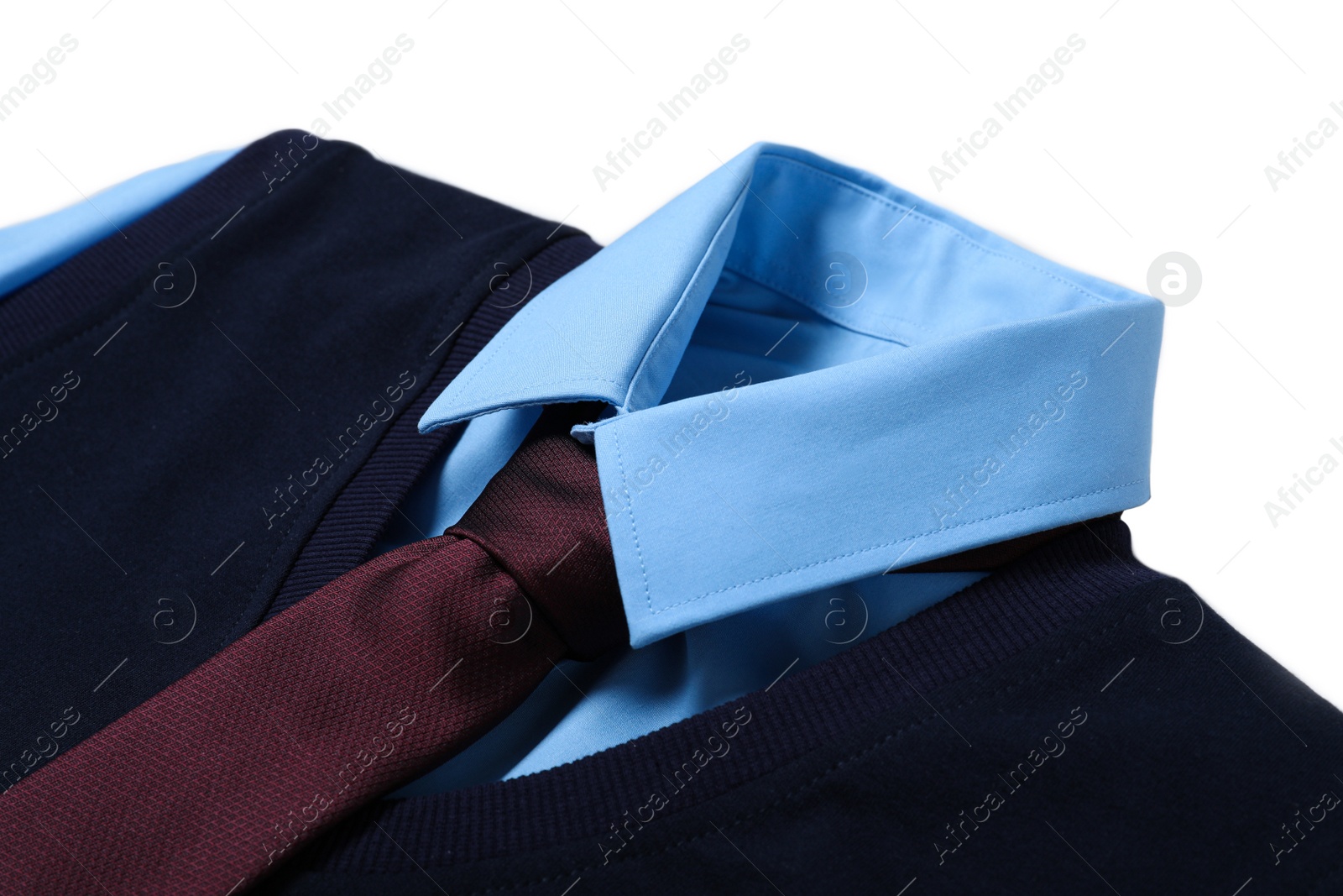 Photo of New stylish school uniform on white background, closeup