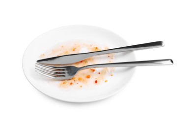 Photo of Dirty plate and cutlery on white background