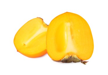 Photo of Halves of delicious ripe juicy persimmons on white background