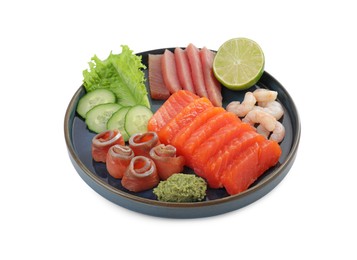 Photo of Tasty sashimi set (raw tuna, salmon slices and shrimp) served with cucumber, lettuce, lime and wasabi isolated on white