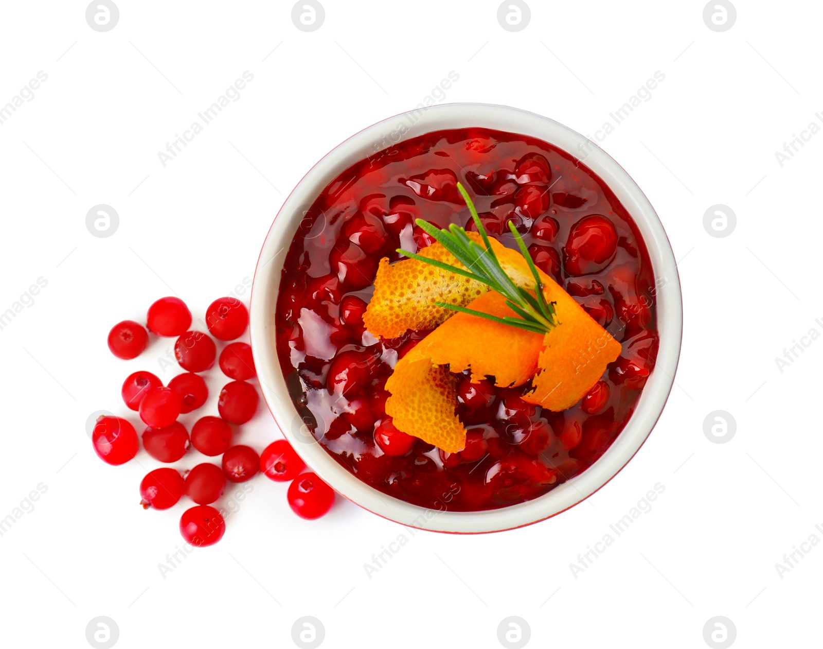 Photo of Cranberry sauce in bowl, fresh berries, rosemary and orange peel isolated on white, top view