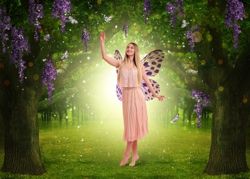 Image of Fairy in magic forest. Girl with butterfly wings among trees