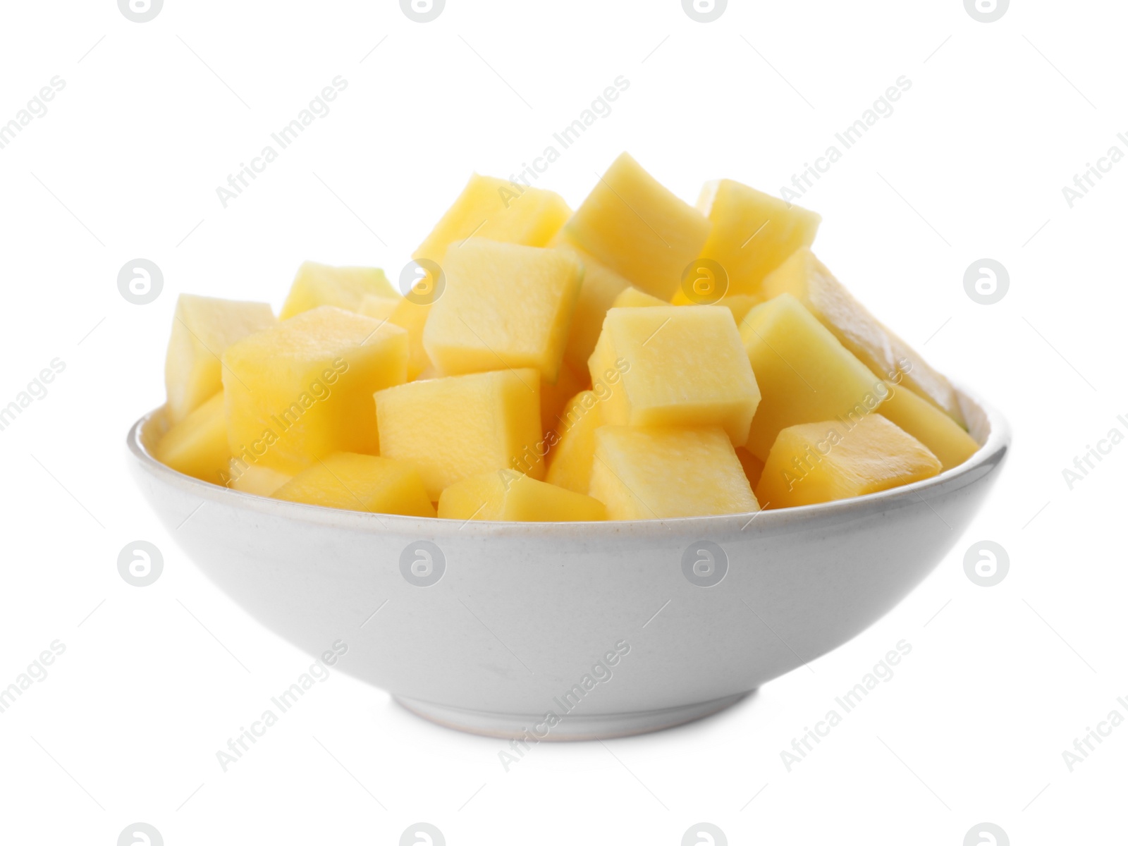 Photo of Tasty mango cubes in ceramic bowl isolated on white