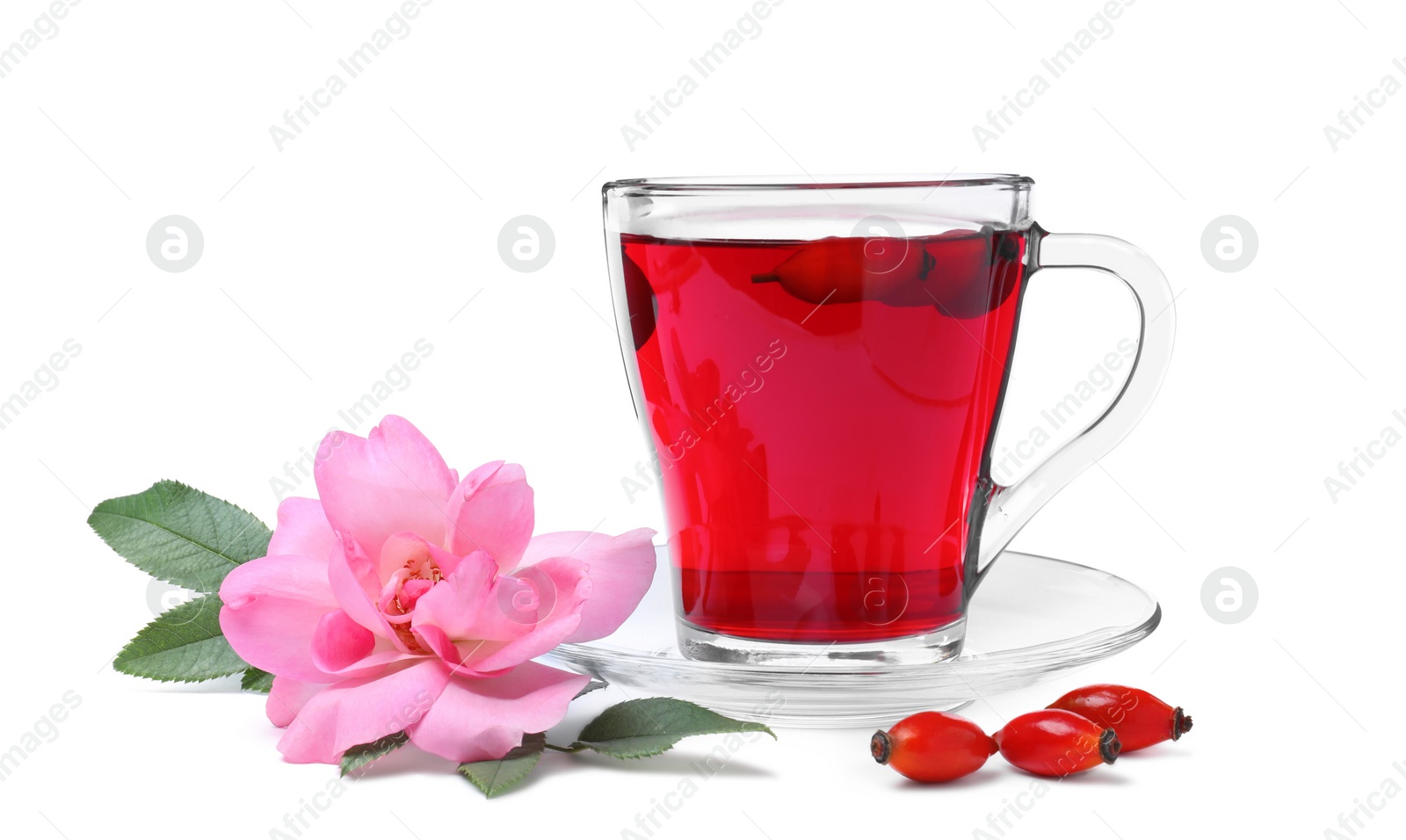 Photo of Aromatic rose hip tea, flower and fresh berries on white background