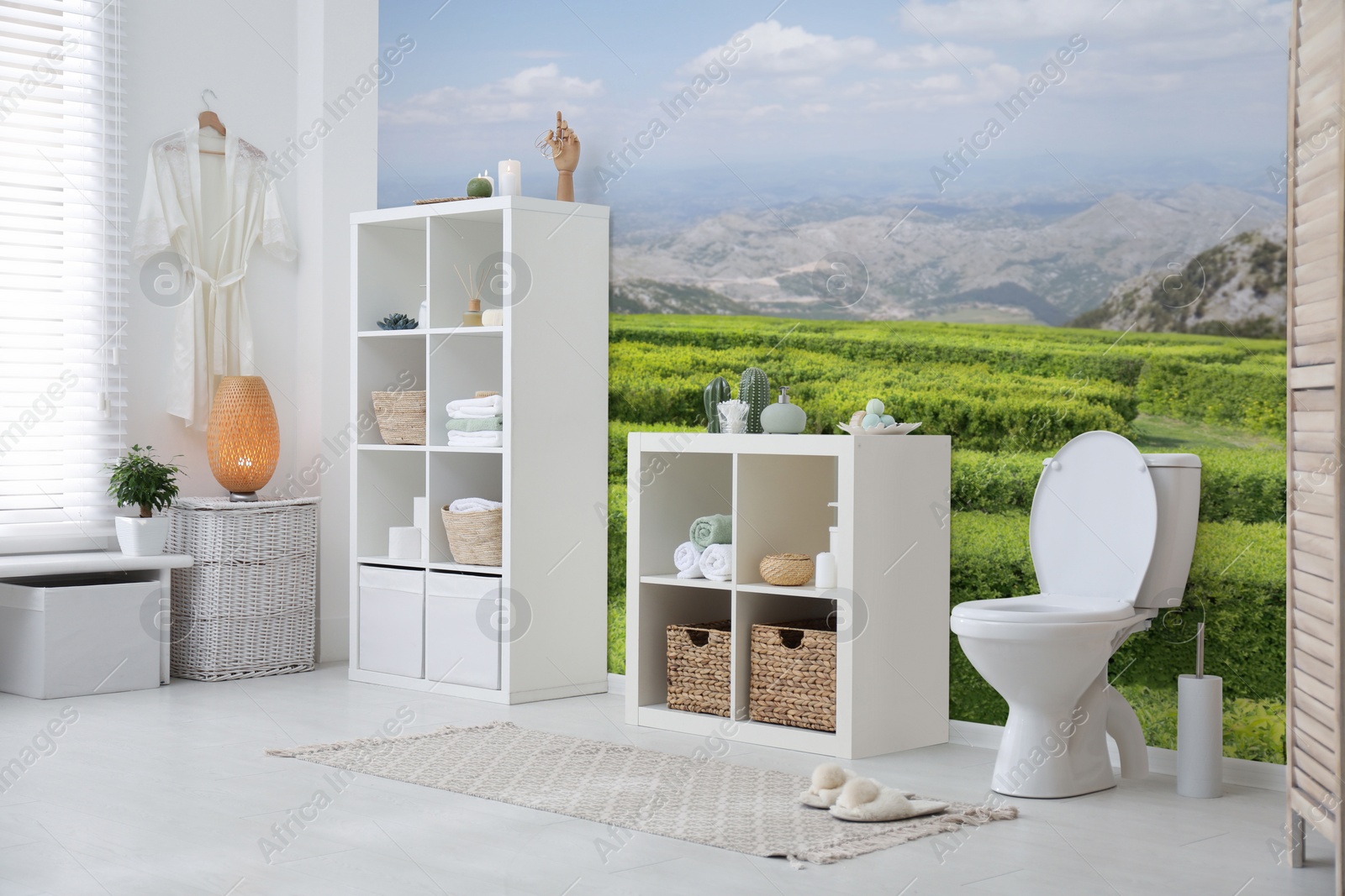 Image of Spacious bathroom interior with furniture and beautiful landscape wallpapers