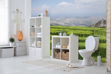 Spacious bathroom interior with furniture and beautiful landscape wallpapers