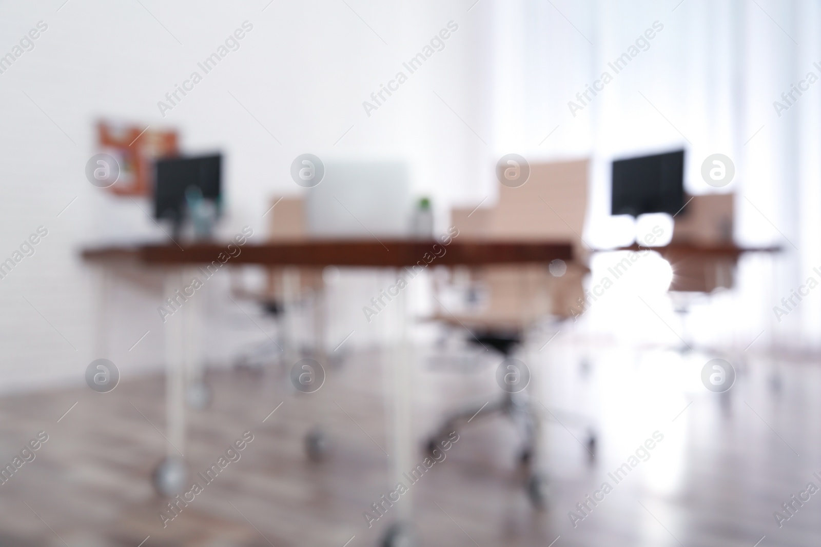 Photo of Modern brightly lit office with bokeh effect