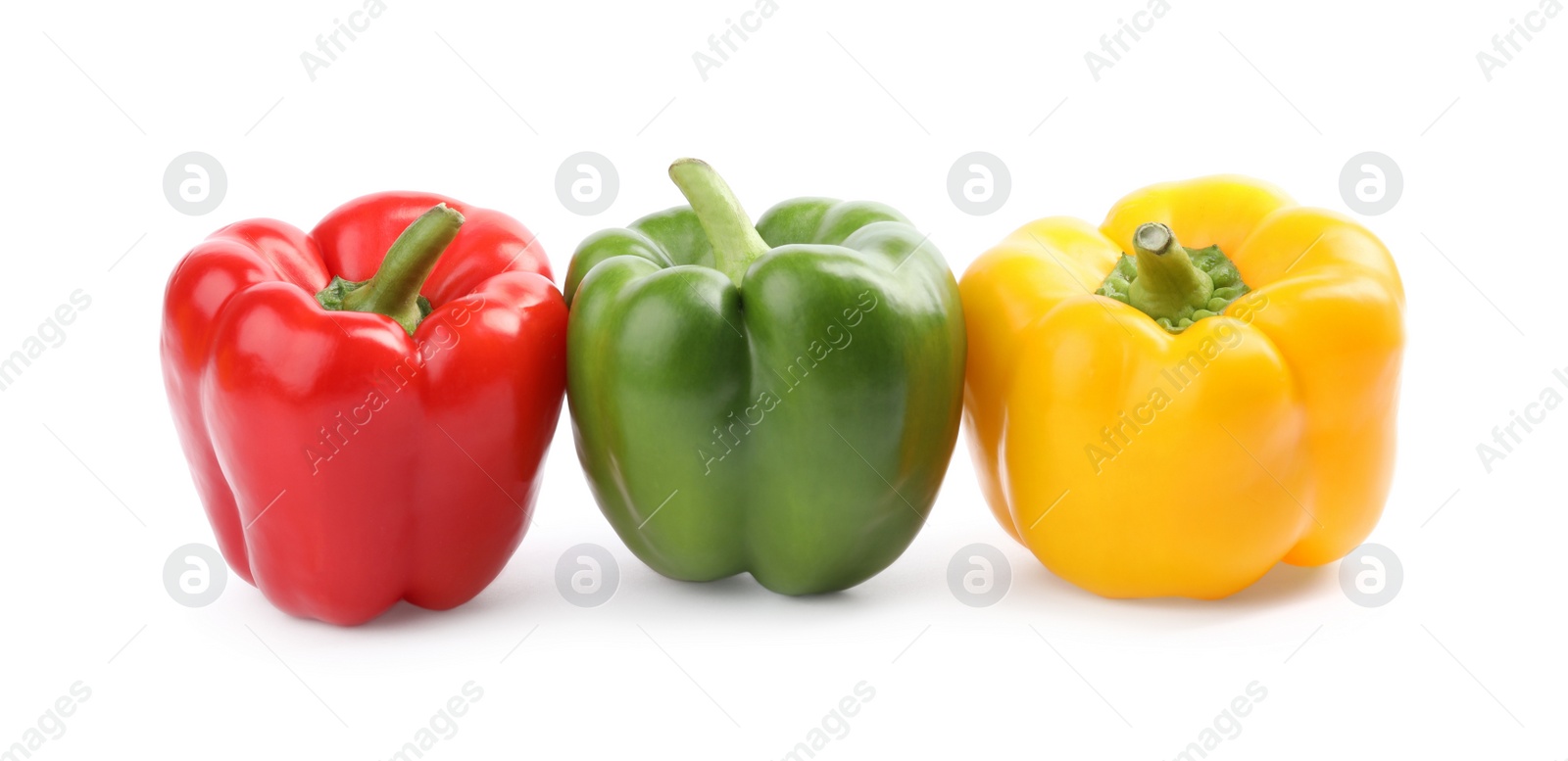 Photo of Fresh ripe colorful bell peppers isolated on white