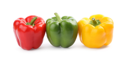 Fresh ripe colorful bell peppers isolated on white