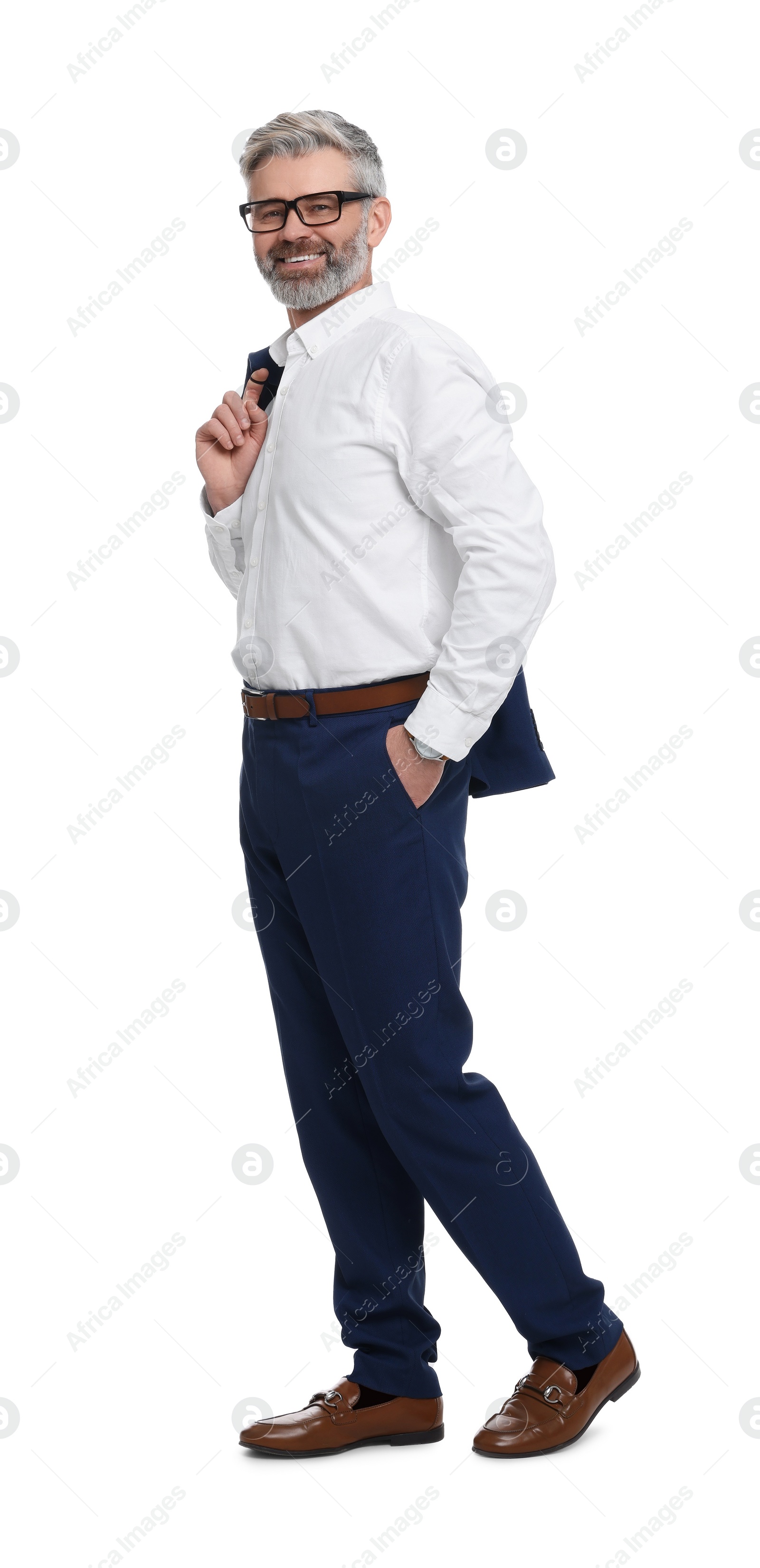 Photo of Mature businessman in stylish clothes posing on white background