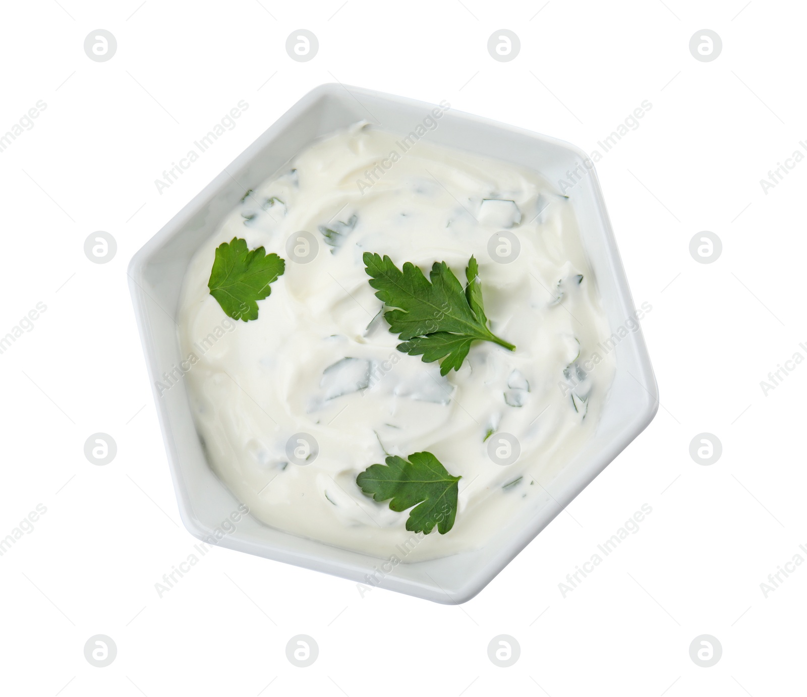 Photo of Bowl with sour cream and herbs on white background, top view