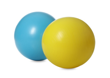 Different colorful fitness balls isolated on white