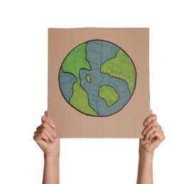 Photo of Protestor holding placard with drawing of Earth on white background, closeup. Climate strike