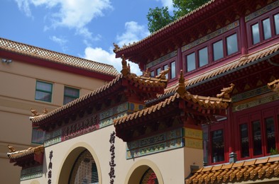 AMSTERDAM, NETHERLANDS - JULY 16, 2022: Beautiful facade of Chinese Hoi Tin restaurant on city street