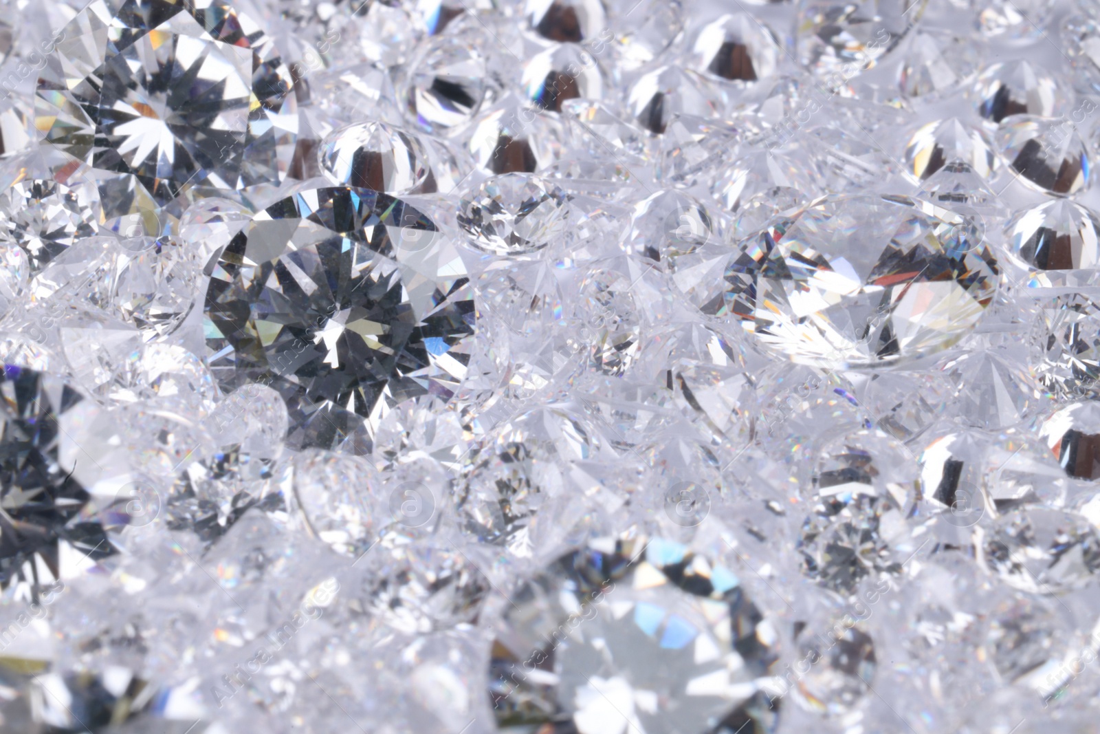 Photo of Many beautiful shiny diamonds as background, closeup