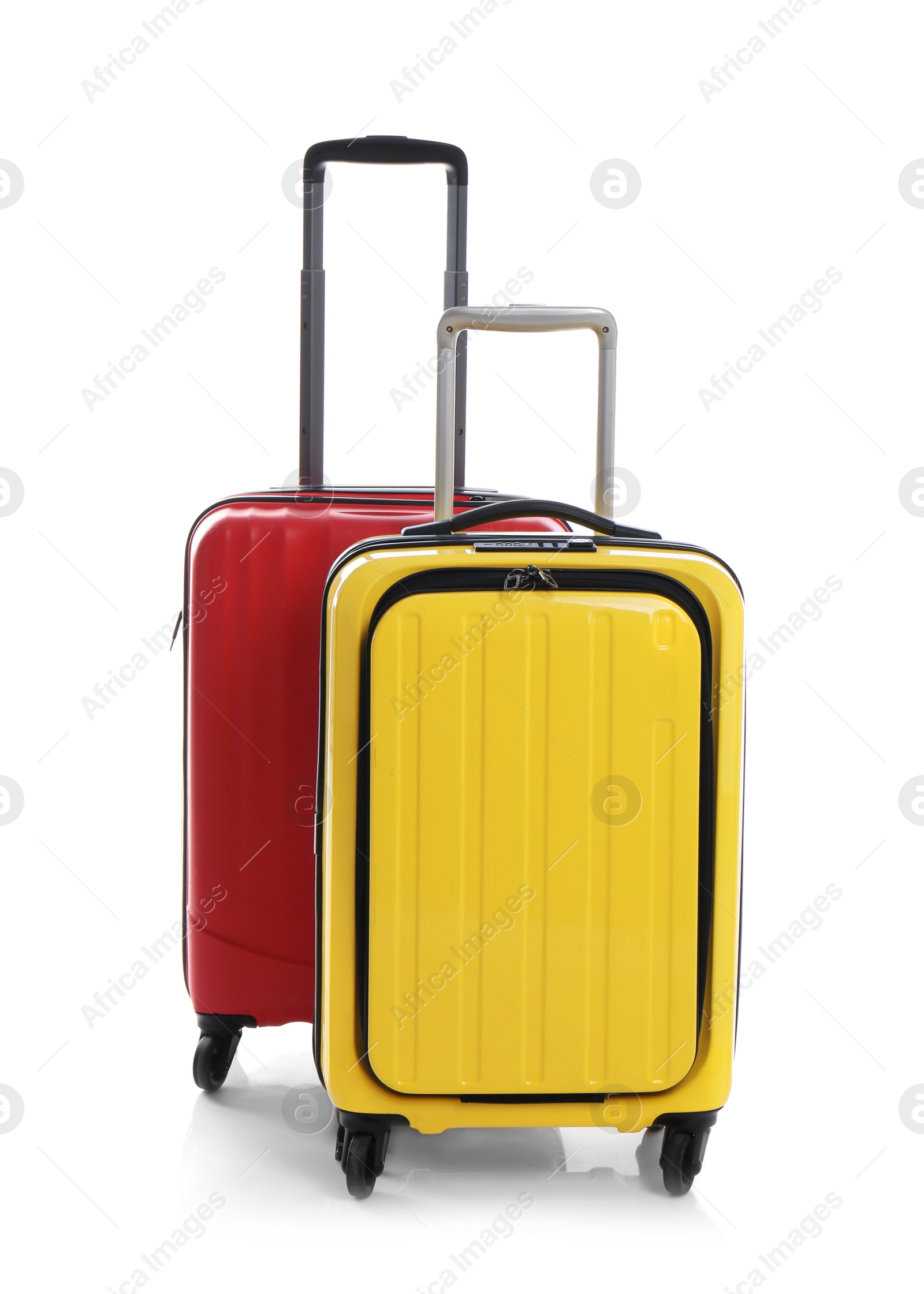 Photo of Modern suitcases for travelling on white background