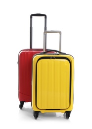 Photo of Modern suitcases for travelling on white background