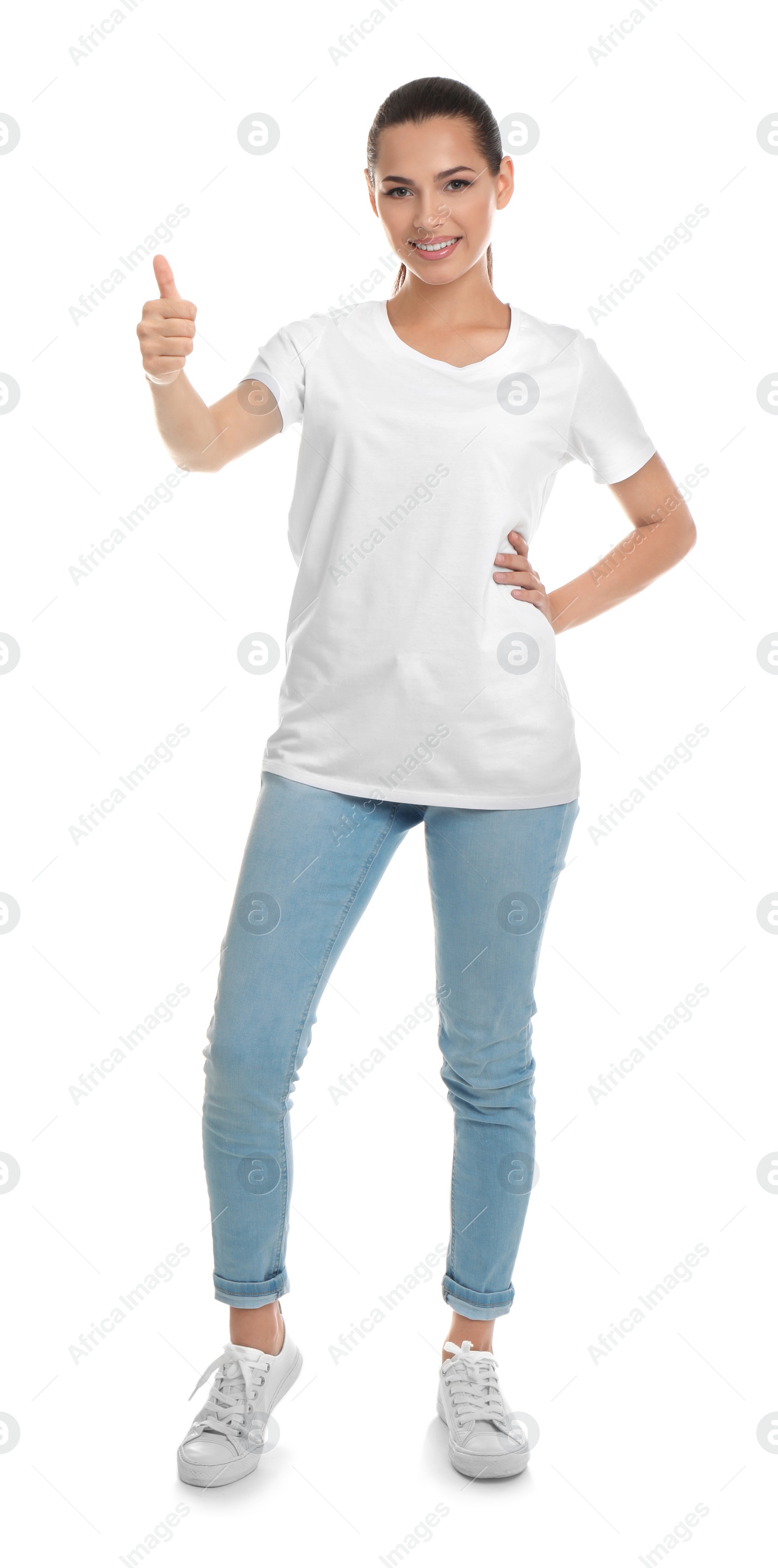 Photo of Young woman in t-shirt on white background. Mockup for design