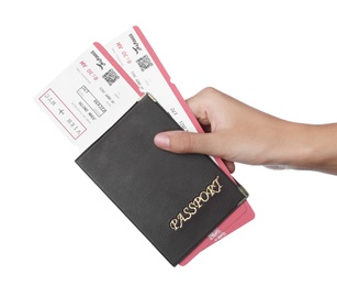 Woman holding passport with tickets on white background, closeup. Travel agency concept